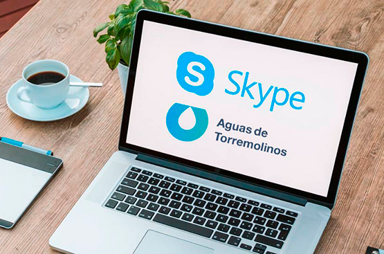 Image of a computer with the Skype and Aguas de Torremolinos logos